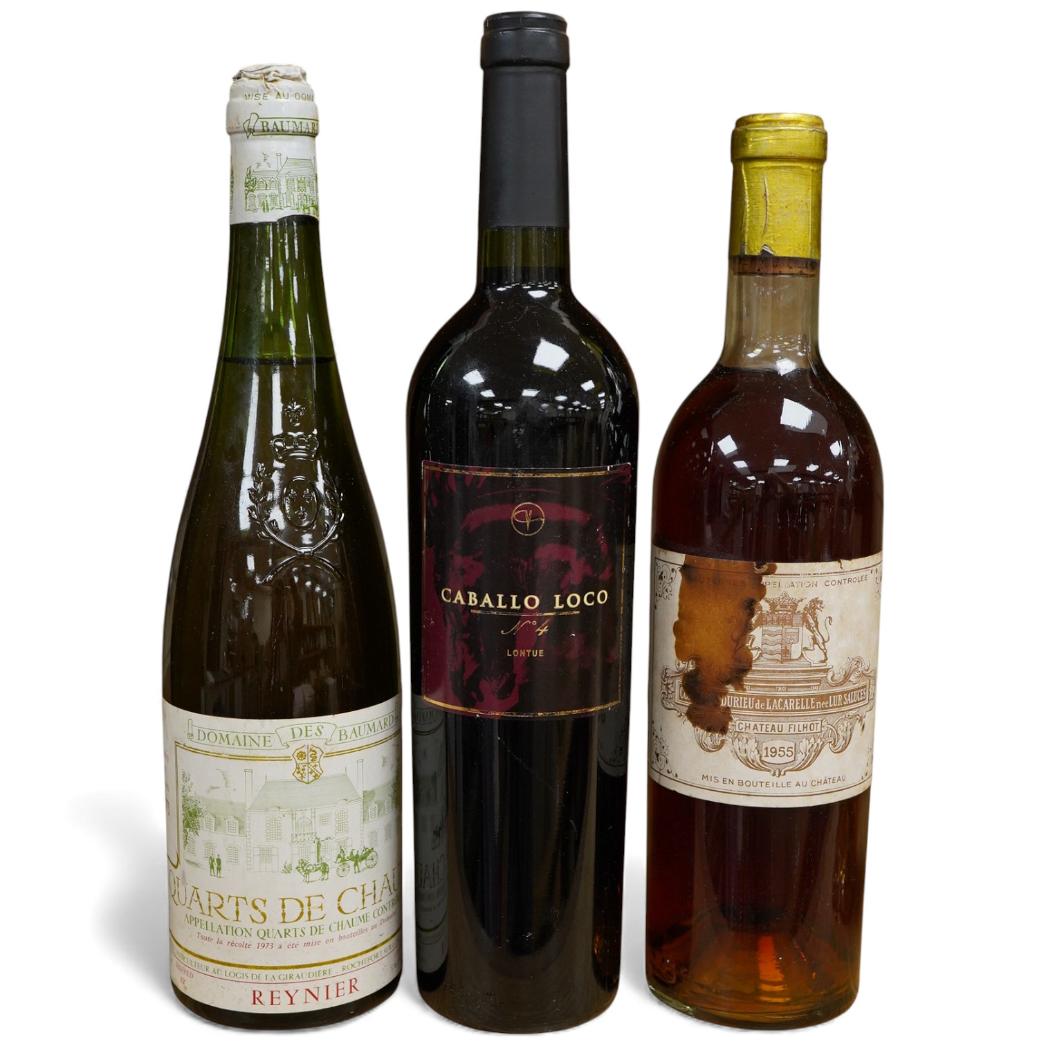 Three bottles of wine, including Chateau Filhot, 1955